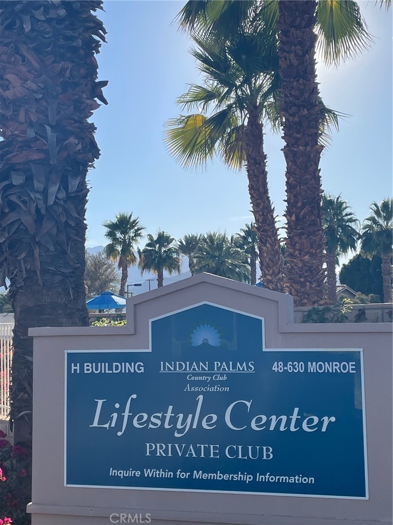 82551 Grant Drive Indio, CA 92201 - Photo 27 of 45 a view of outdoor space with signage and flags
