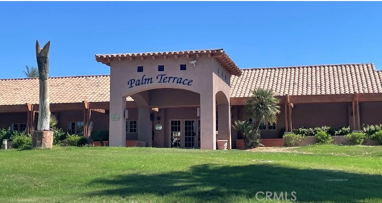 82551 Grant Drive Indio, CA 92201 - Photo 31 of 45 a view of a house with a yard