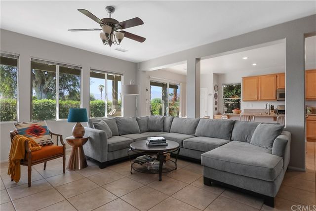 a kitchen with stainless steel appliances granite countertop a stove a microwave and cabinets