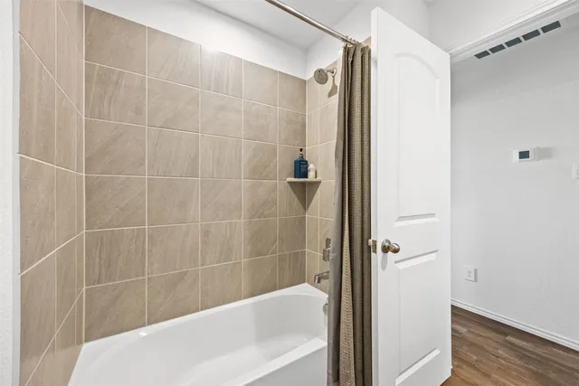 a bathroom with a bathtub