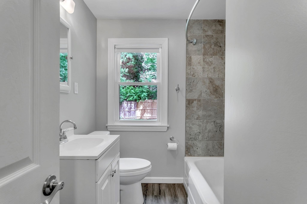 97 Old Brook Road Springfield, MA 01118 - Photo 22 of 42 a bathroom with a sink toilet and shower