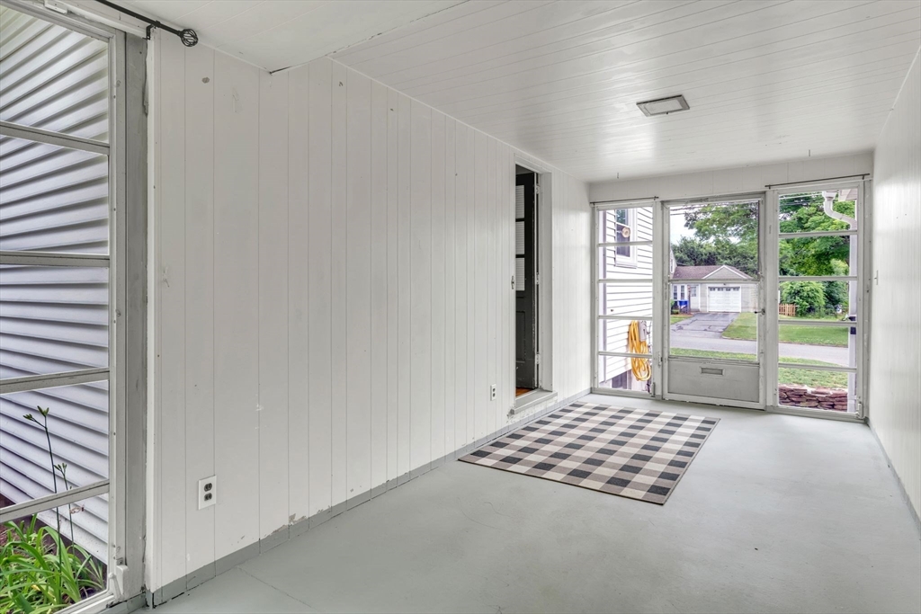 97 Old Brook Road Springfield, MA 01118 - Photo 37 of 42 a room with a bed and a window with balcony view