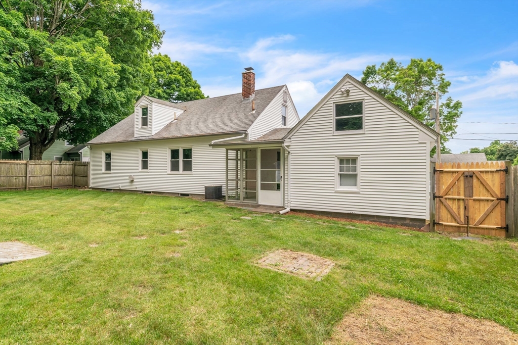 97 Old Brook Road Springfield, MA 01118 - Photo 40 of 42 a view of a backyard with a garden and plants