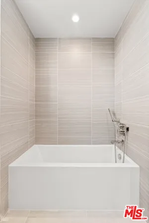 a bathroom with a bathtub