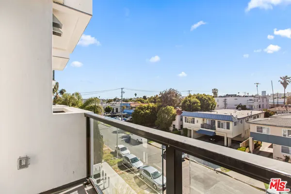 a view of city from a balcony
