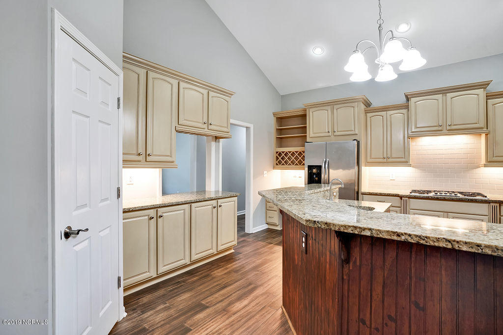 780 McKay Road Southeast Bolivia, NC 28422 - Photo 13 of 42 Large pantry in addition to ample cabinetry