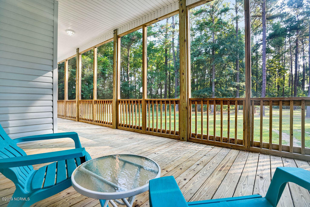 780 McKay Road Southeast Bolivia, NC 28422 - Photo 17 of 42 screened porch off kitchen