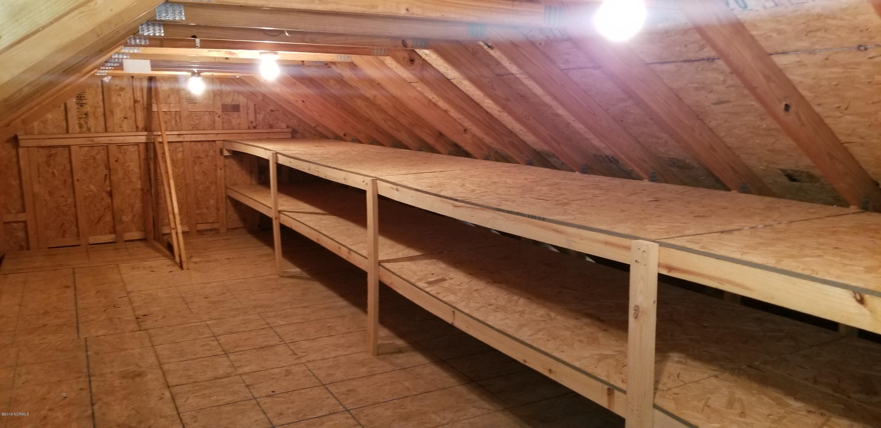 780 McKay Road Southeast Bolivia, NC 28422 - Photo 37 of 42 storage above attic in garage