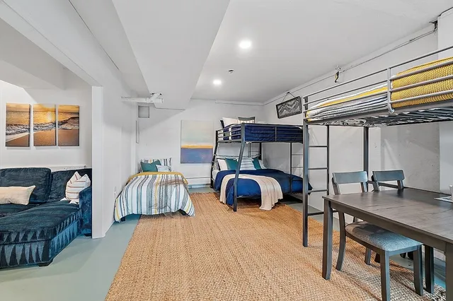 a bedroom with furniture and a bed