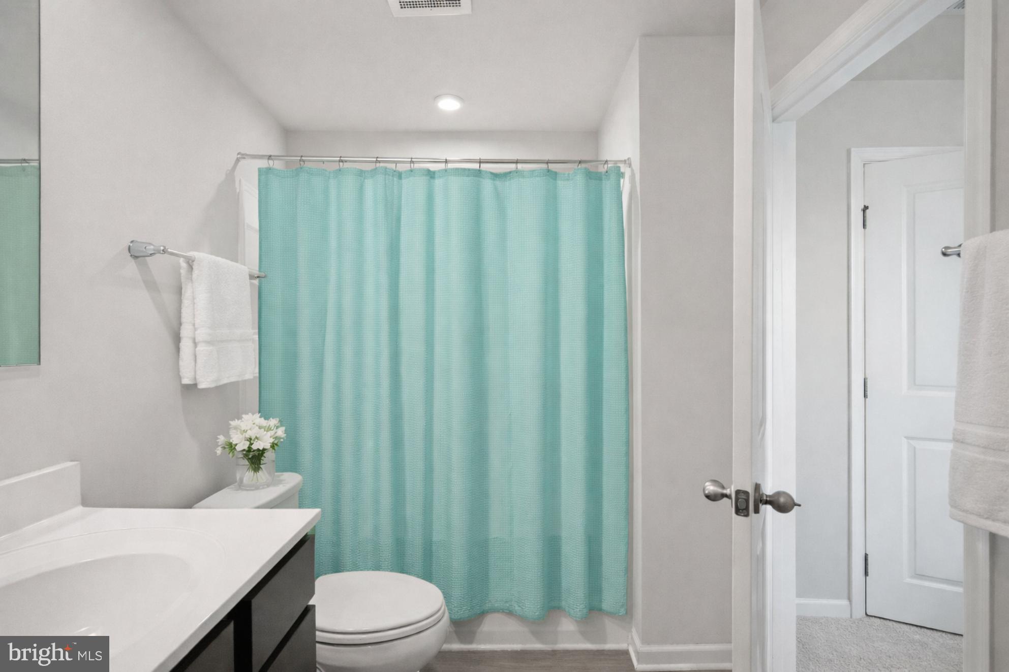 21 Mulberry Lane Clementon, NJ 08021 - Photo 23 of 39 a bathroom with a sink a toilet and shower
