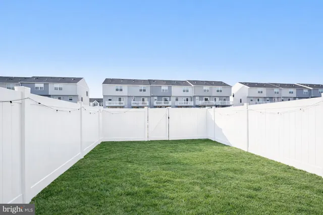 a view of a backyard with flat screen tv