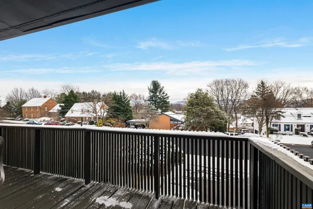 a kitchen with stainless steel appliances a stove a sink and a microwave