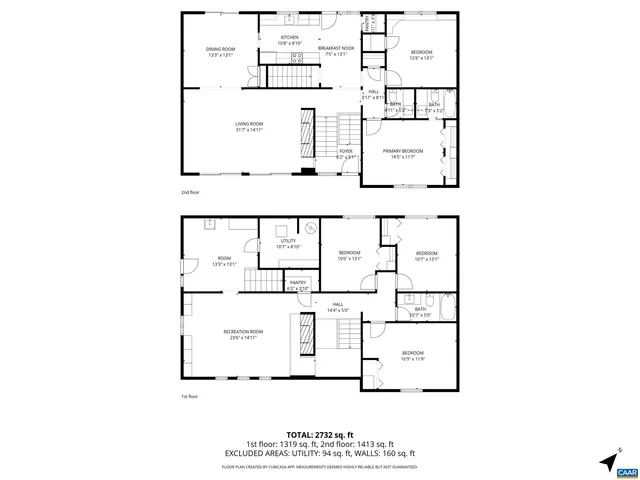 a yellow house with trees in front of it