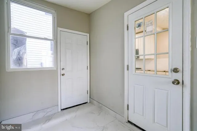 an empty room with windows