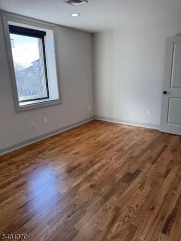a view of room and wooden floor