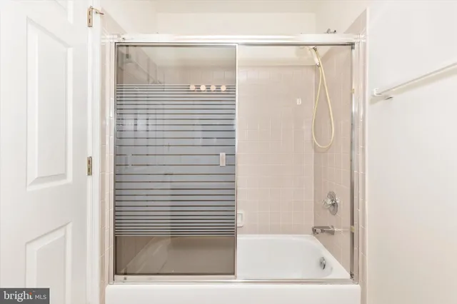 an empty room with wooden floor