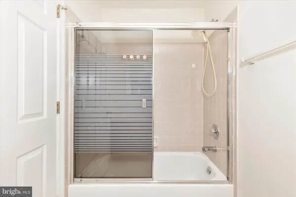 an empty room with wooden floor