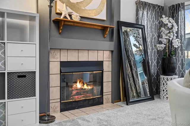 a view of a fireplace with a living room