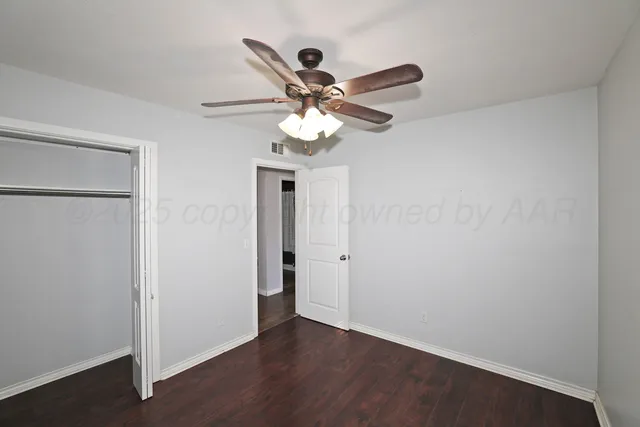 a view of a ceiling fan in a room