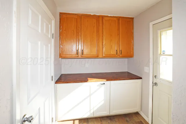 a room with a sink and a window