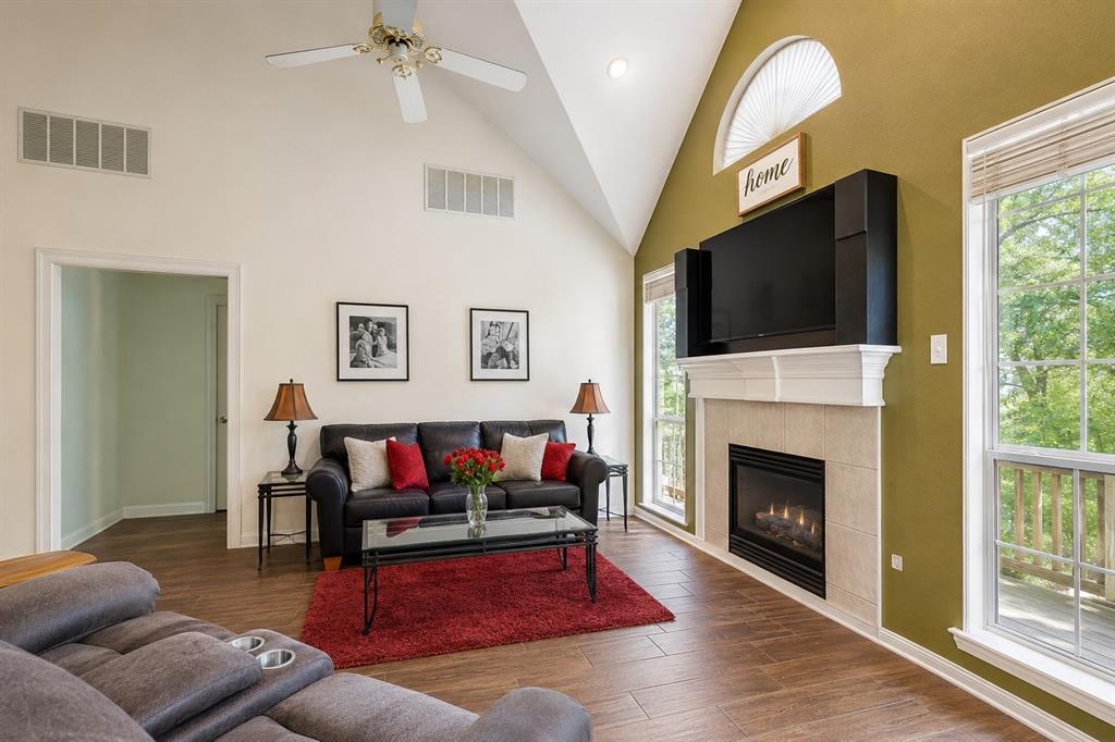 1508 Valley Creek Road Denton, TX 76205 - Photo 8 of 33 a living room with furniture fireplace and flat screen tv