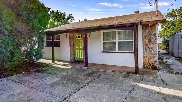 a front view of a house with a porch