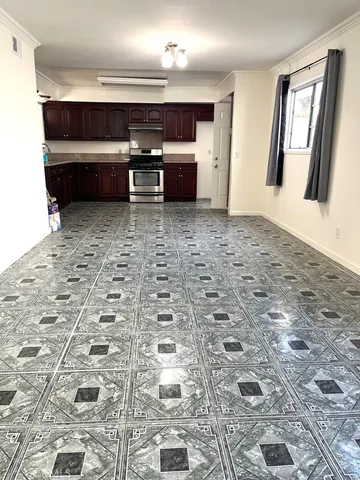 a view of a livingroom with furniture