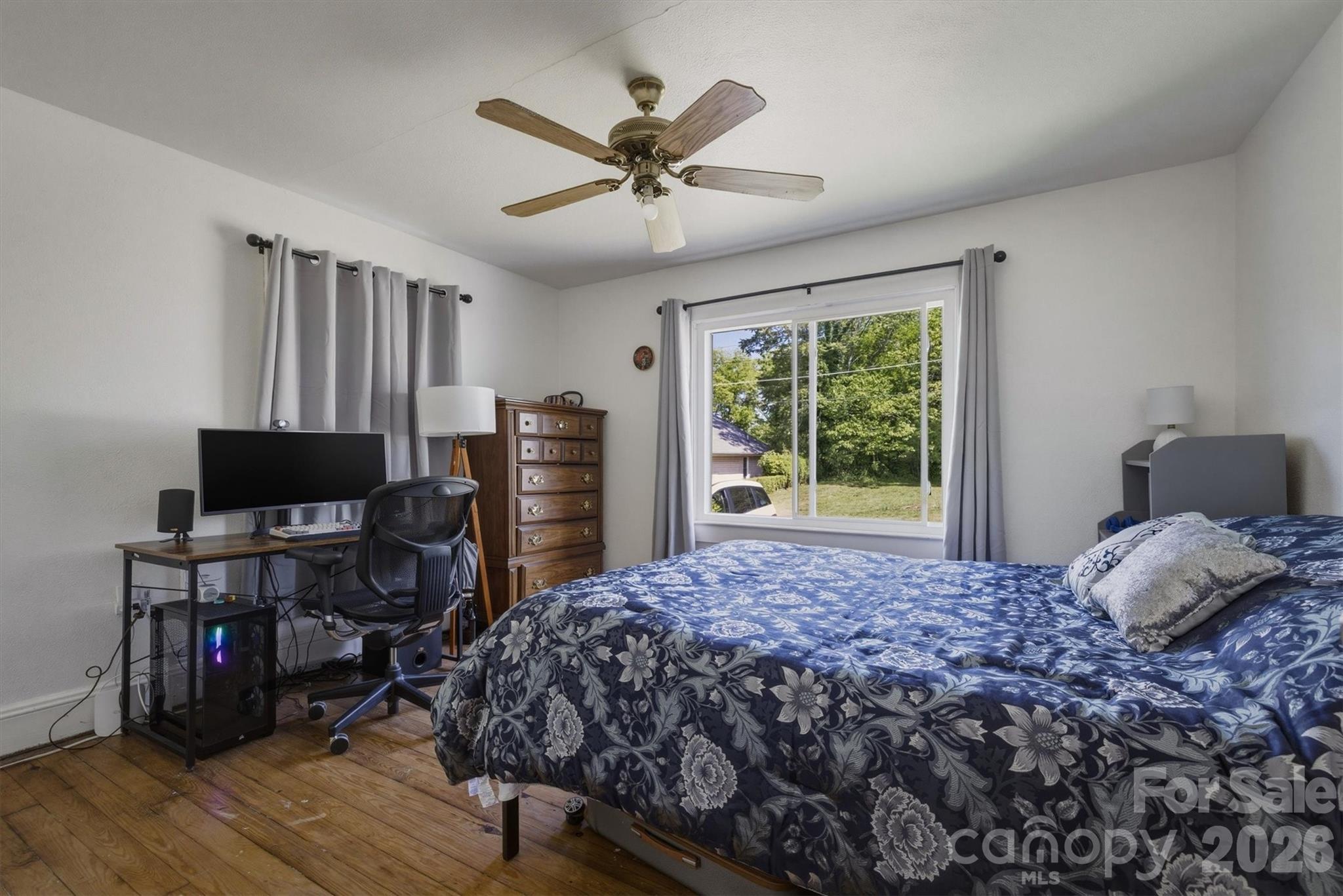 117 3rd Avenue Southwest Hickory, NC 28602 - Photo 15 of 21 a bedroom with a bed and a window