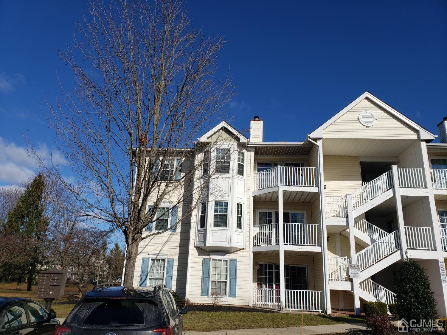 351 Wimbeldon Court North Brunswick, NJ 08902 - Photo 1 of 17 a front view of multiple houses