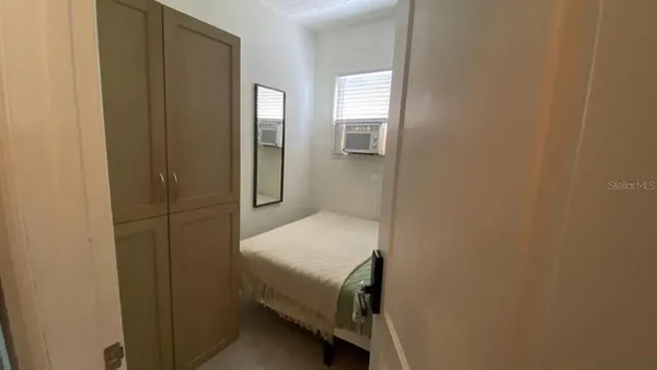 a bathroom with a shower and toilet