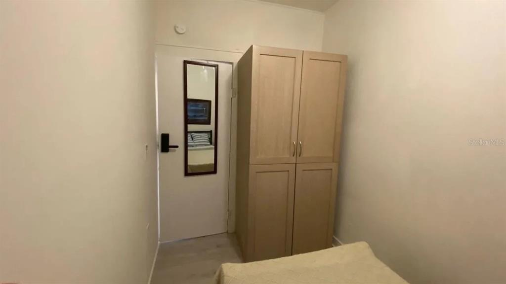 4427 Raleigh Street Orlando, FL 32811 - Photo 27 of 31 a bathroom with a shower and toilet