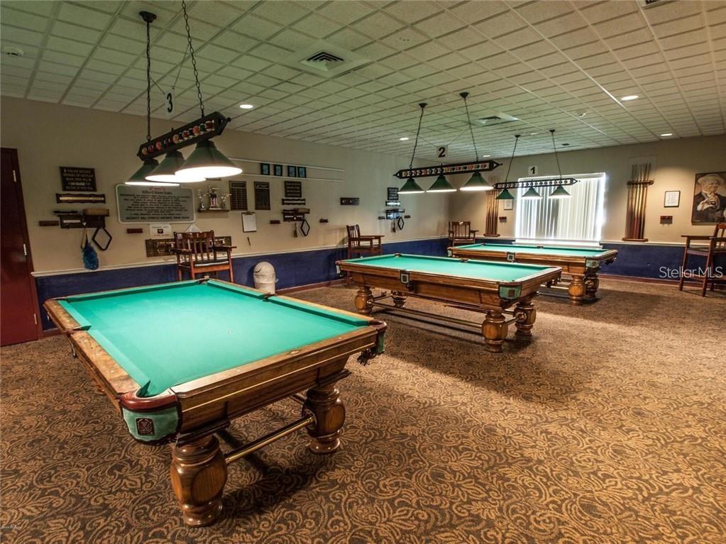 8038 Southwest 108th Loop Ocala, FL 34481 - Photo 47 of 48 a room with pool tables and flat screen tv