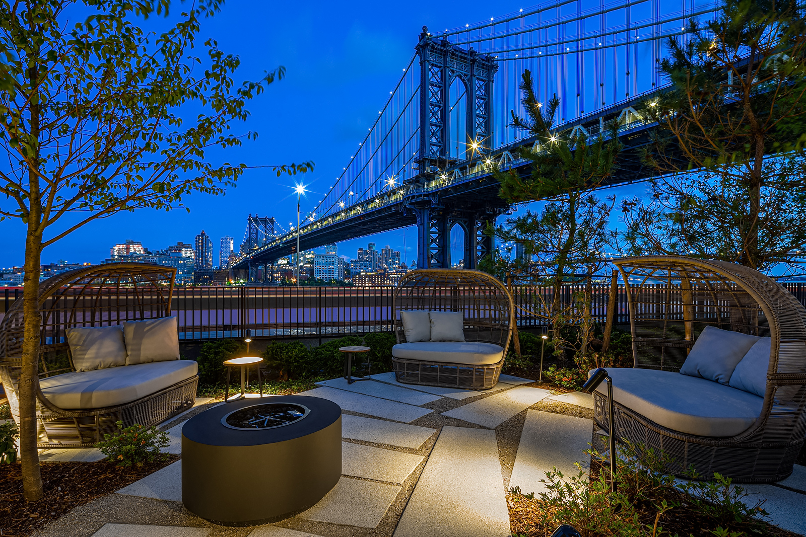 252 South Street, Unit 68C Manhattan, NY 10002 - Photo 54 of 70 a view of a patio with couches chairs and potted plants
