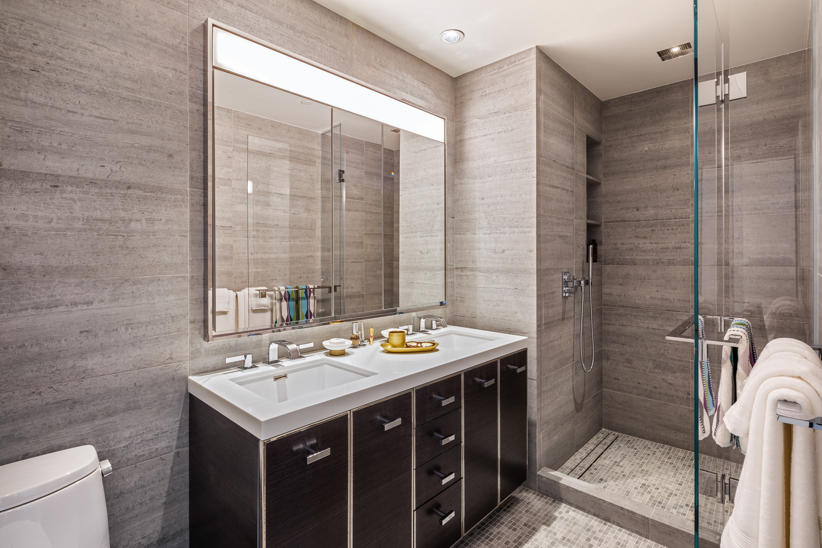 252 South Street, Unit 68C Manhattan, NY 10002 - Photo 7 of 70 a bathroom with a sink and a mirror