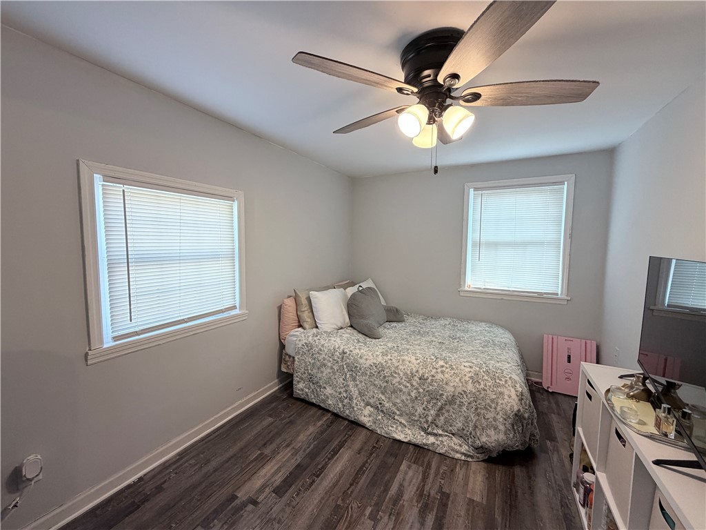 6800 Farmington Road Miamisburg, OH 45342 - Photo 20 of 32 This cozy bedroom features durable wood flooring and ample natural light.