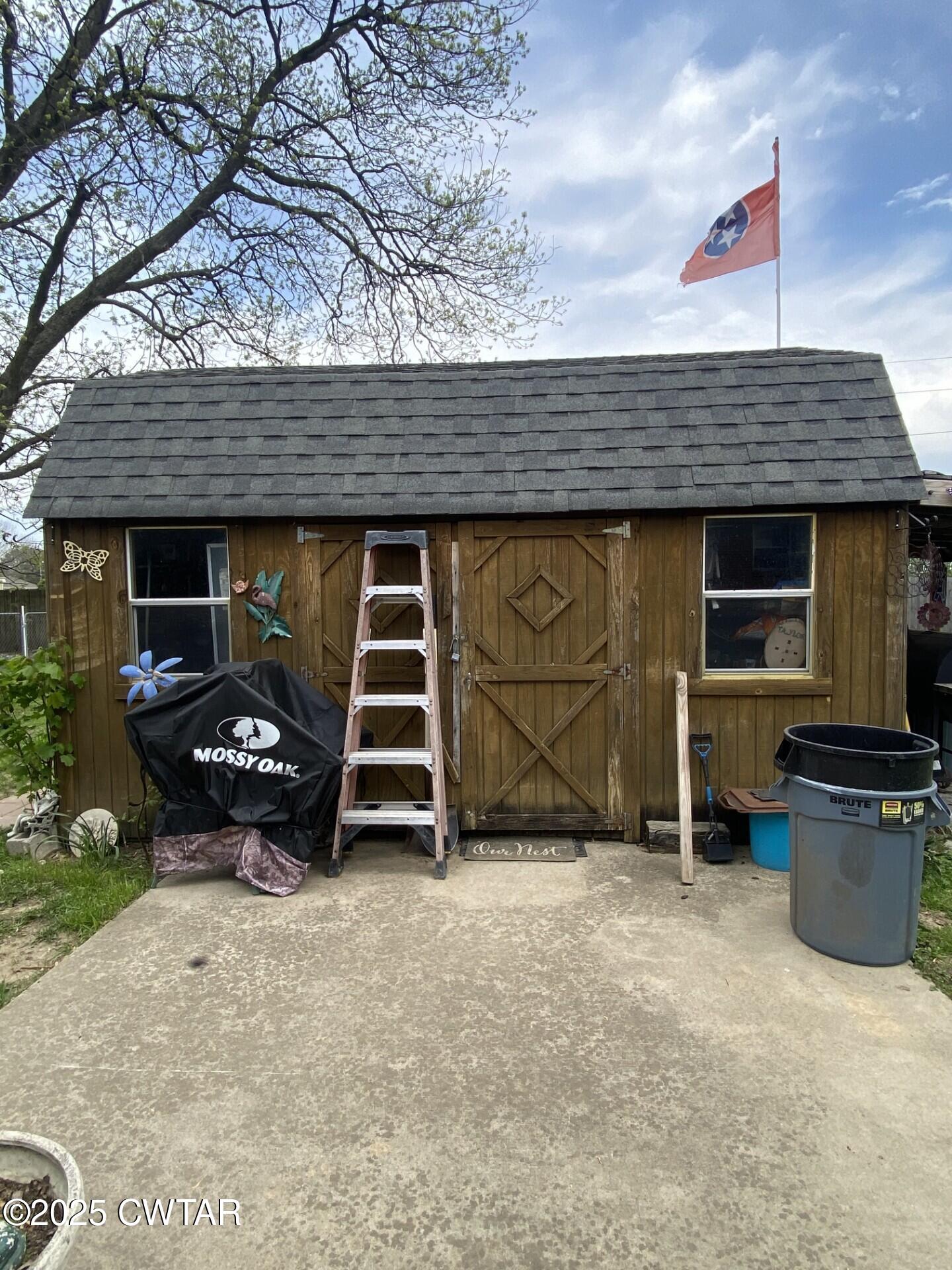 604 South Main Street Ridgely, TN 38080 - Photo 3 of 25 an outdoor view of a garage