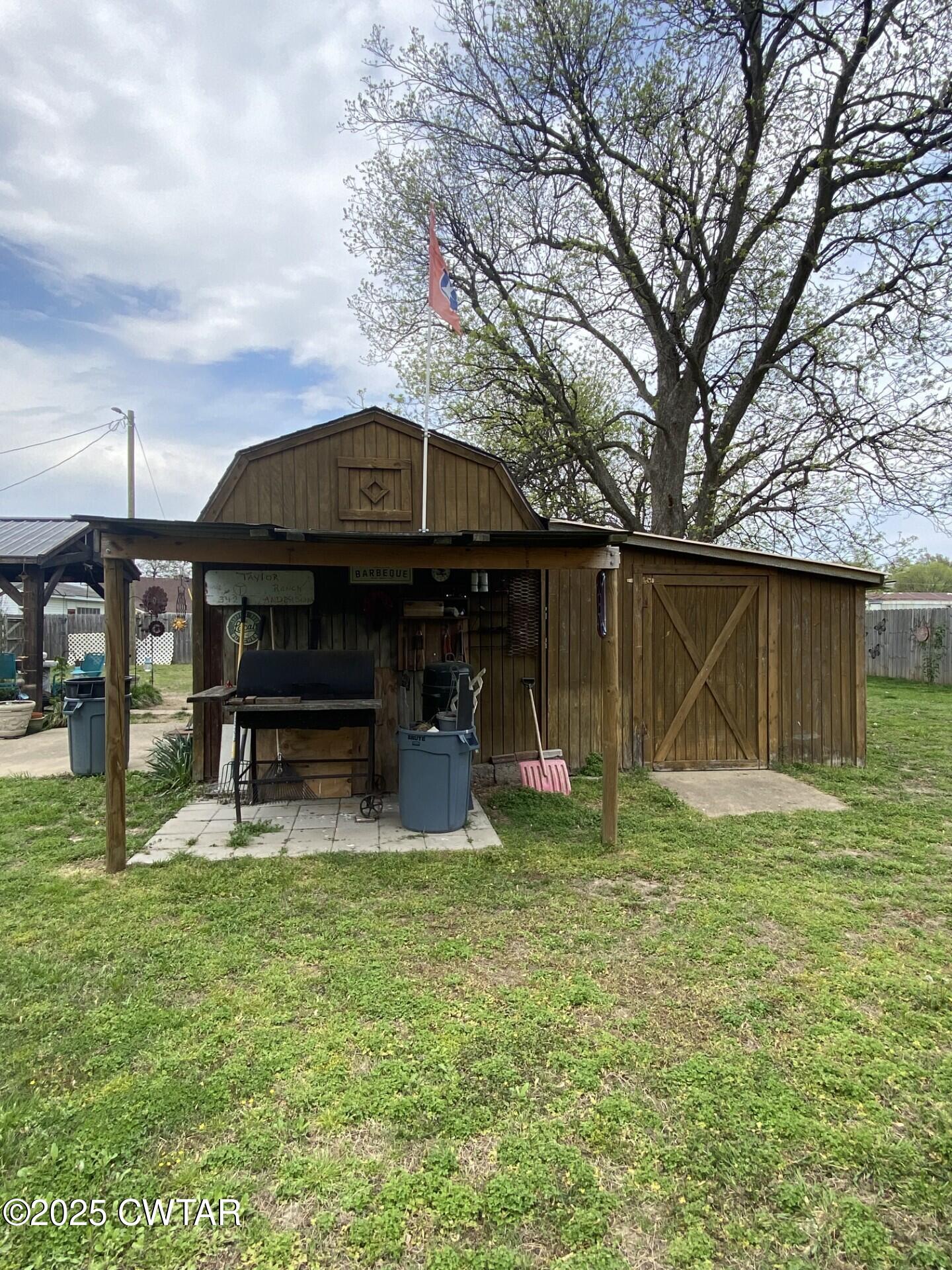 604 South Main Street Ridgely, TN 38080 - Photo 7 of 25 a view of a house with a yard