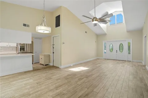 a view of an empty room and window