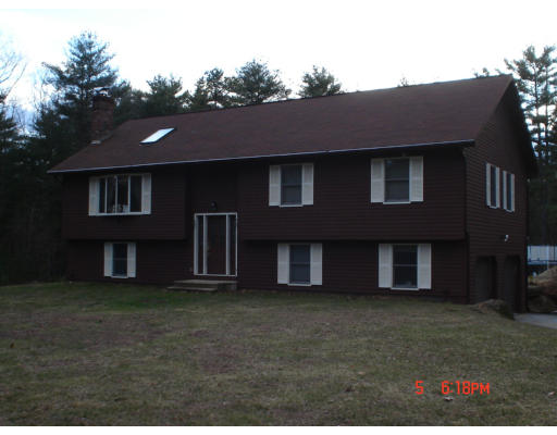 126 Pierce Road West Brookfield, MA 01585 - Photo 1 of 1 a front view of a house with a yard