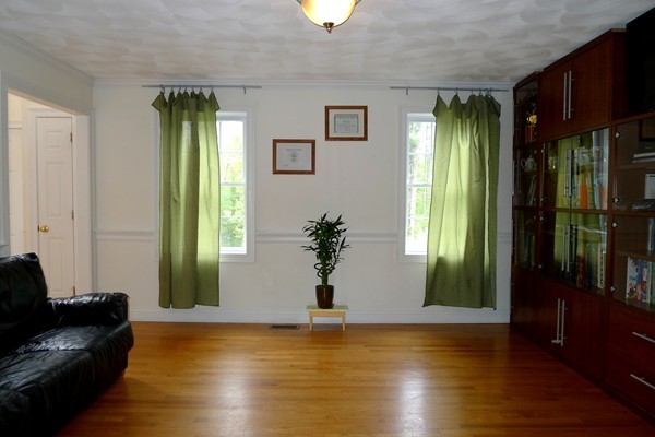 117 Tyler Road Townsend, MA 01469 - Photo 6 of 11 a view of a livingroom with furniture and a window