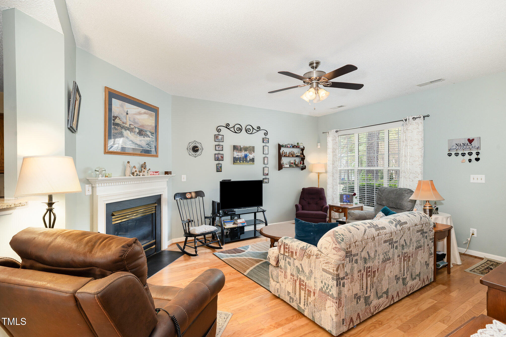 5557 Fieldcross Court Raleigh, NC 27610 - Photo 3 of 16 Family Room with Gas Fireplace