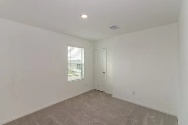 a view of empty room with window