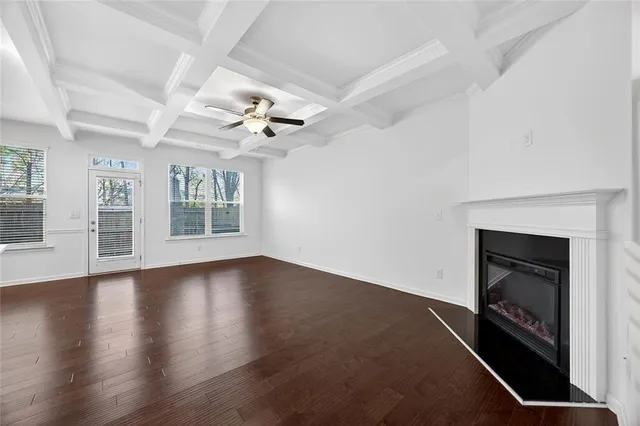 a kitchen with stainless steel appliances a refrigerator and a stove top oven