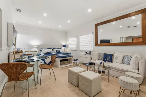 a living room with furniture and a table