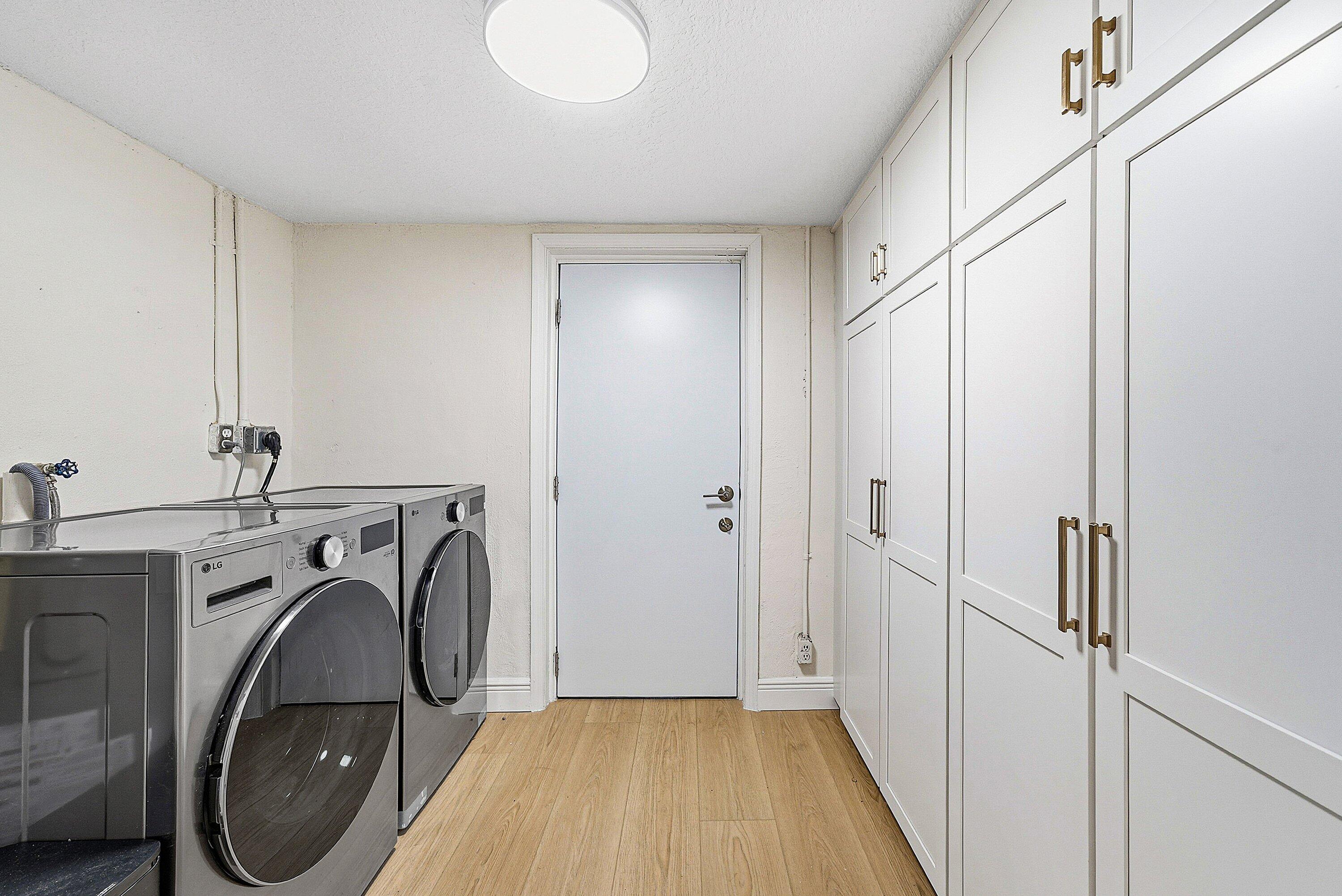 435 Northeast 35th Street Boca Raton, FL 33431 - Photo 26 of 62 a view of a storage & utility room with a washer dryer