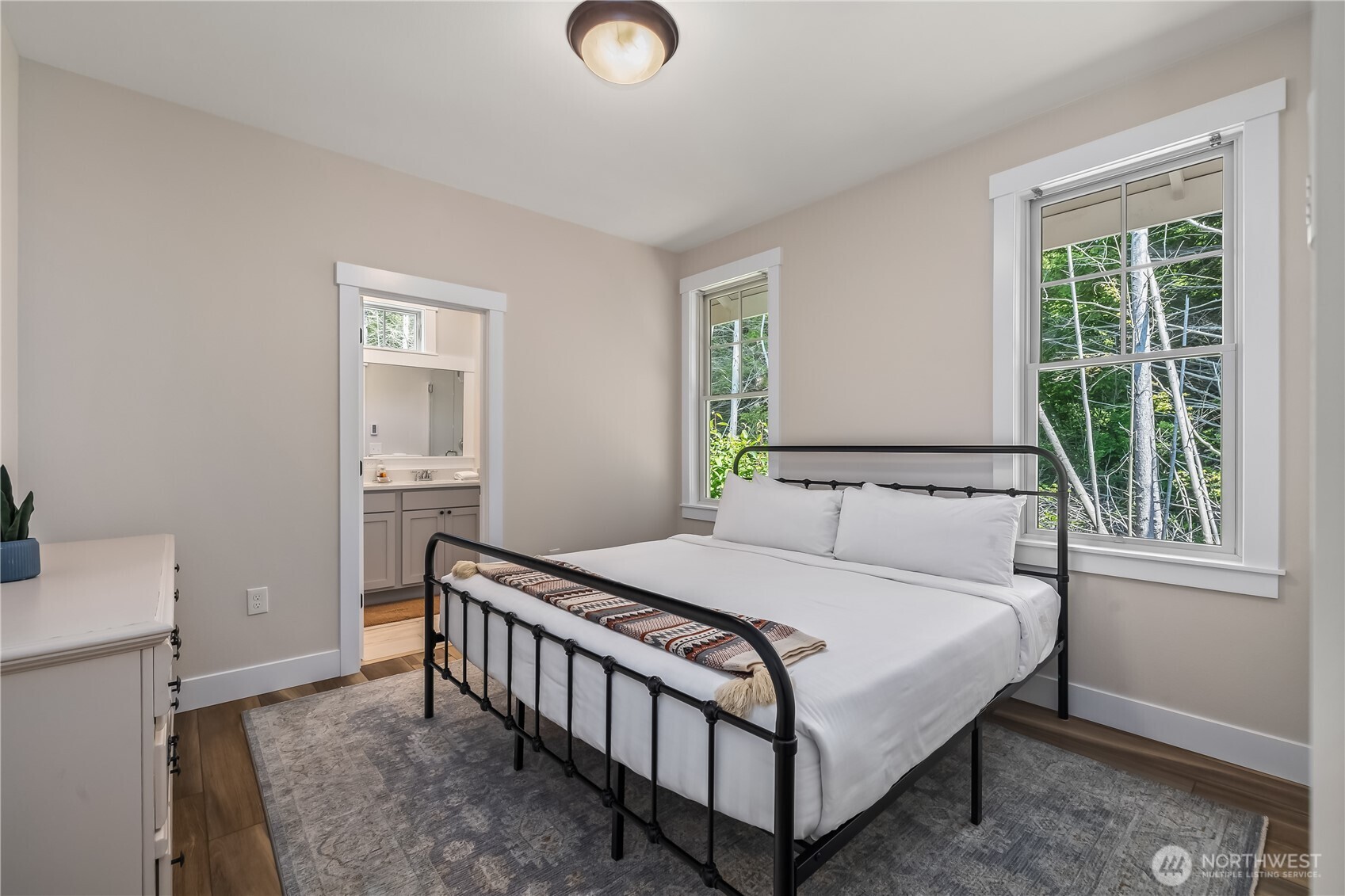 24 Switchback Lane Pacific Beach, WA 98571 - Photo 14 of 20 a bedroom with a bed and a window