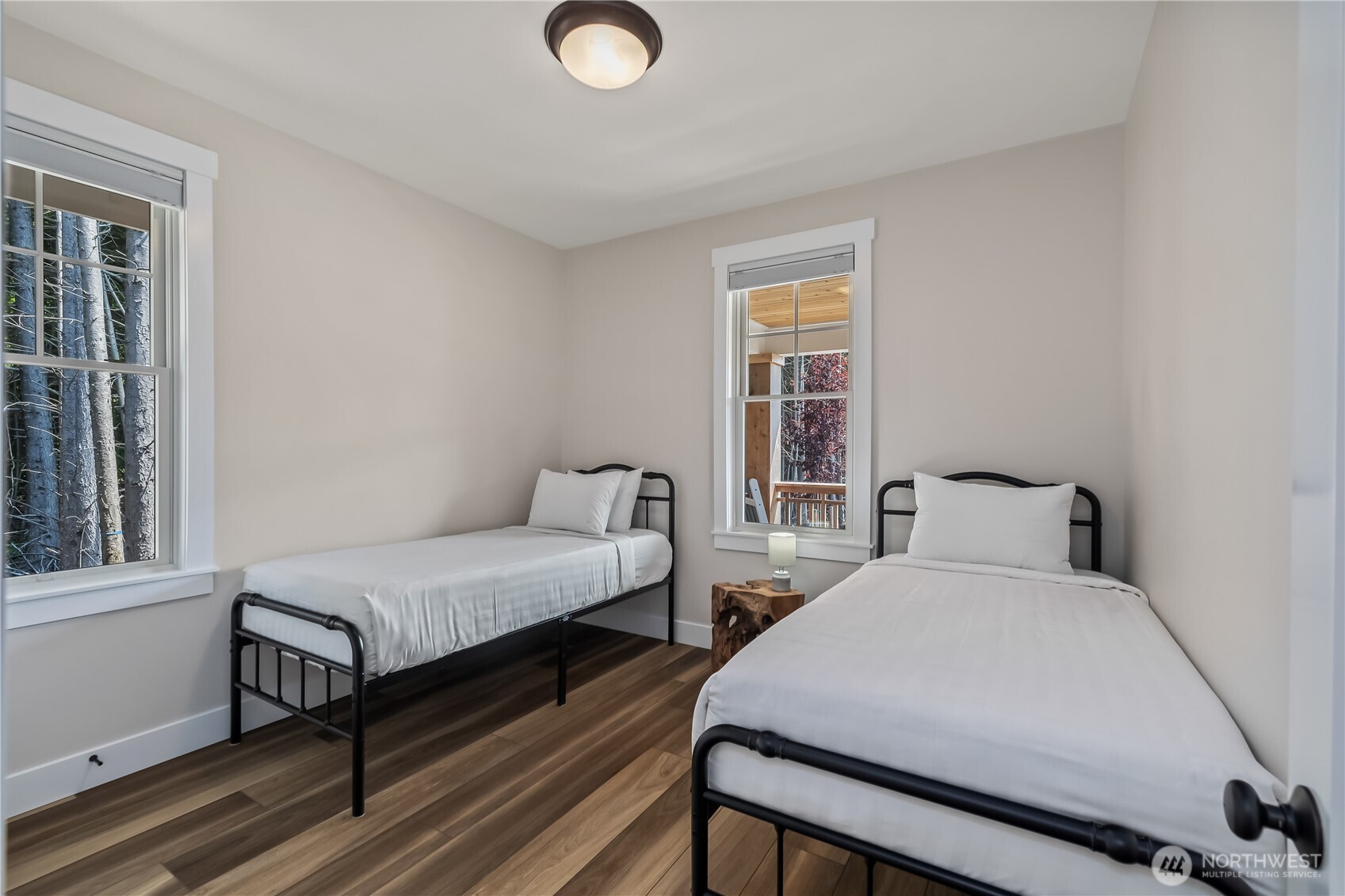 24 Switchback Lane Pacific Beach, WA 98571 - Photo 16 of 20 a bedroom with two beds and a window