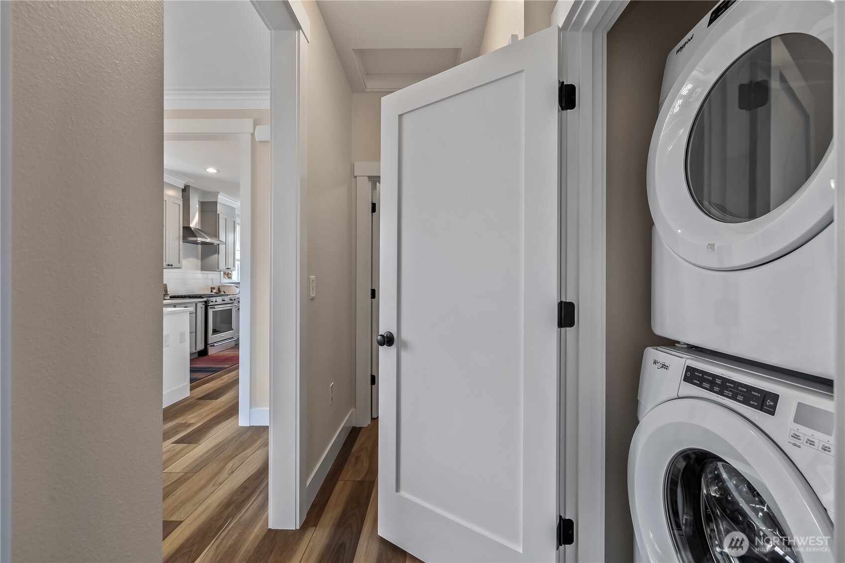 24 Switchback Lane Pacific Beach, WA 98571 - Photo 18 of 20 a view of a hallway with washer and dryer