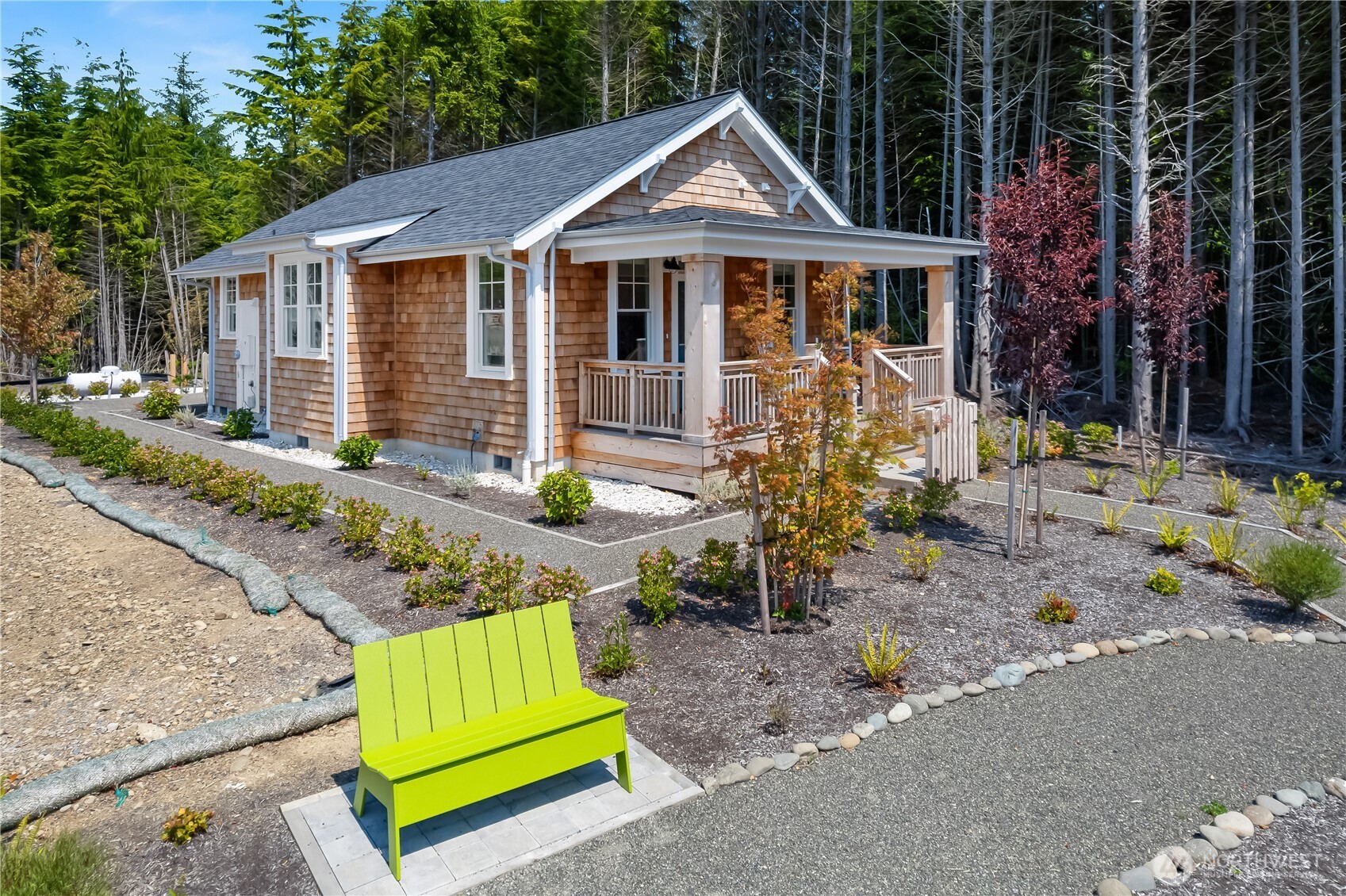 24 Switchback Lane Pacific Beach, WA 98571 - Photo 2 of 20 a front view of a house with garden