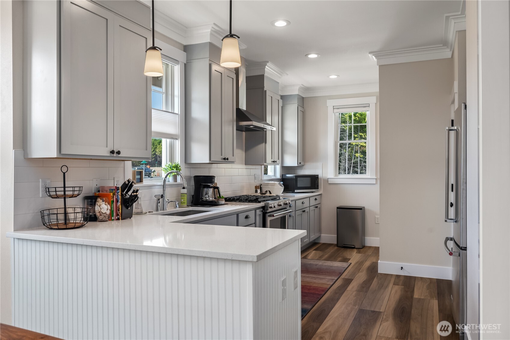 24 Switchback Lane Pacific Beach, WA 98571 - Photo 10 of 20 a kitchen with cabinets a sink and appliances